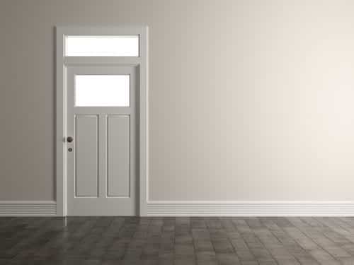 Interior door with fresh baseboard and casing trim installed by Build By Manny in Knoxville, TN