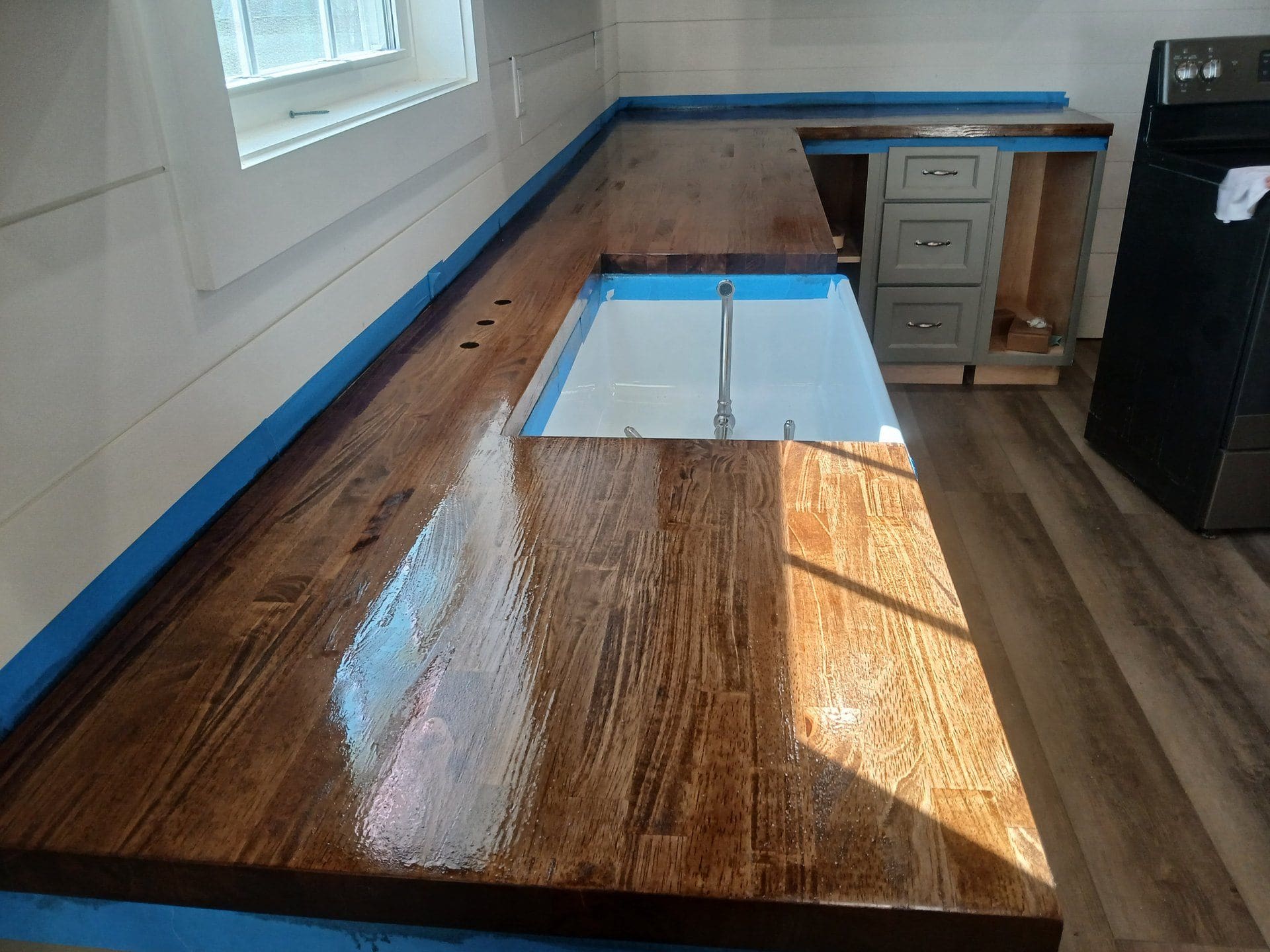 Freshly stained butcher-block countertop installed by Build By Manny in Knoxville, TN